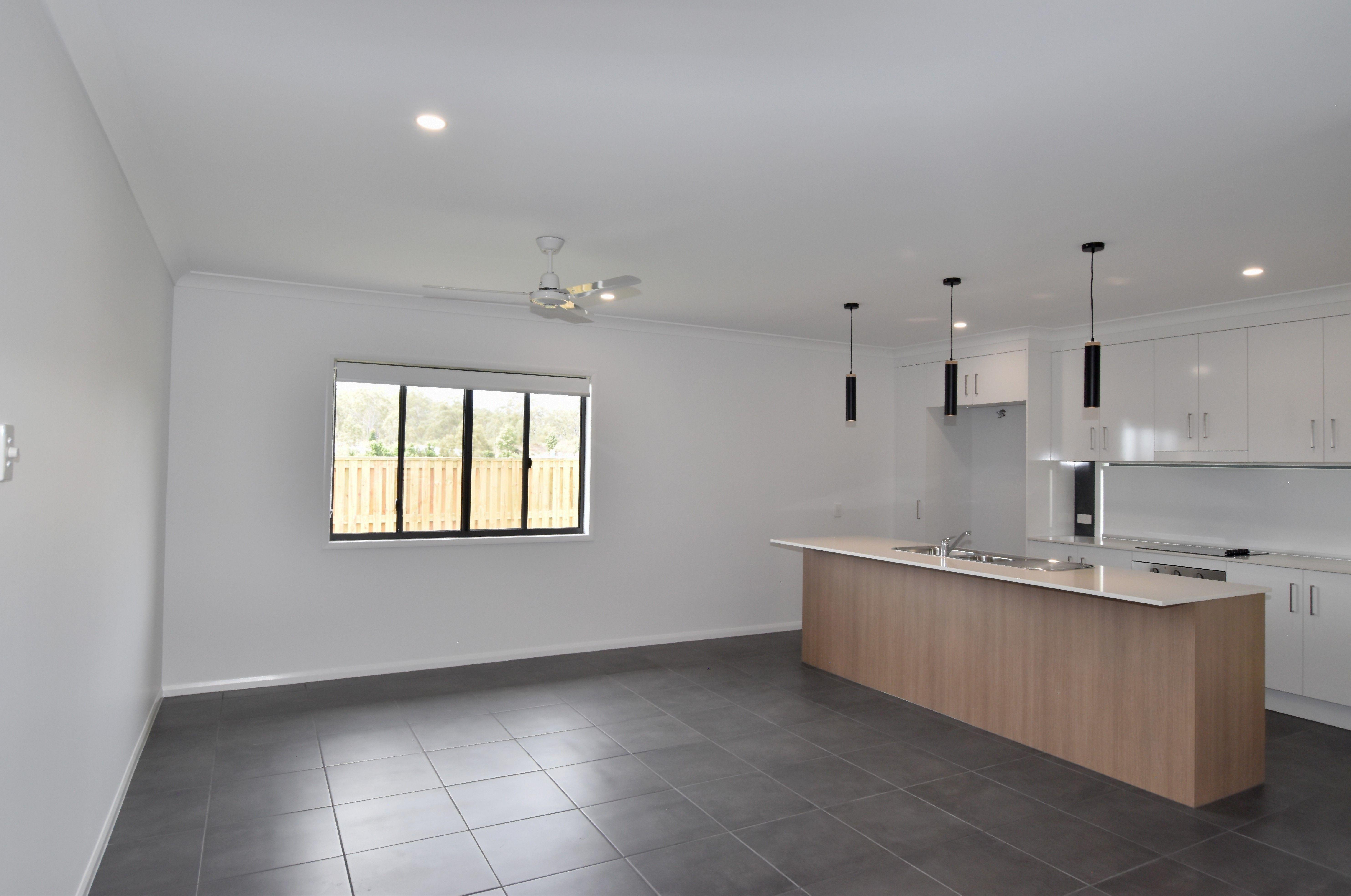 MODERN FOUR BEDROOM HOME IN THE HEART OF RIVERSTONE RISE