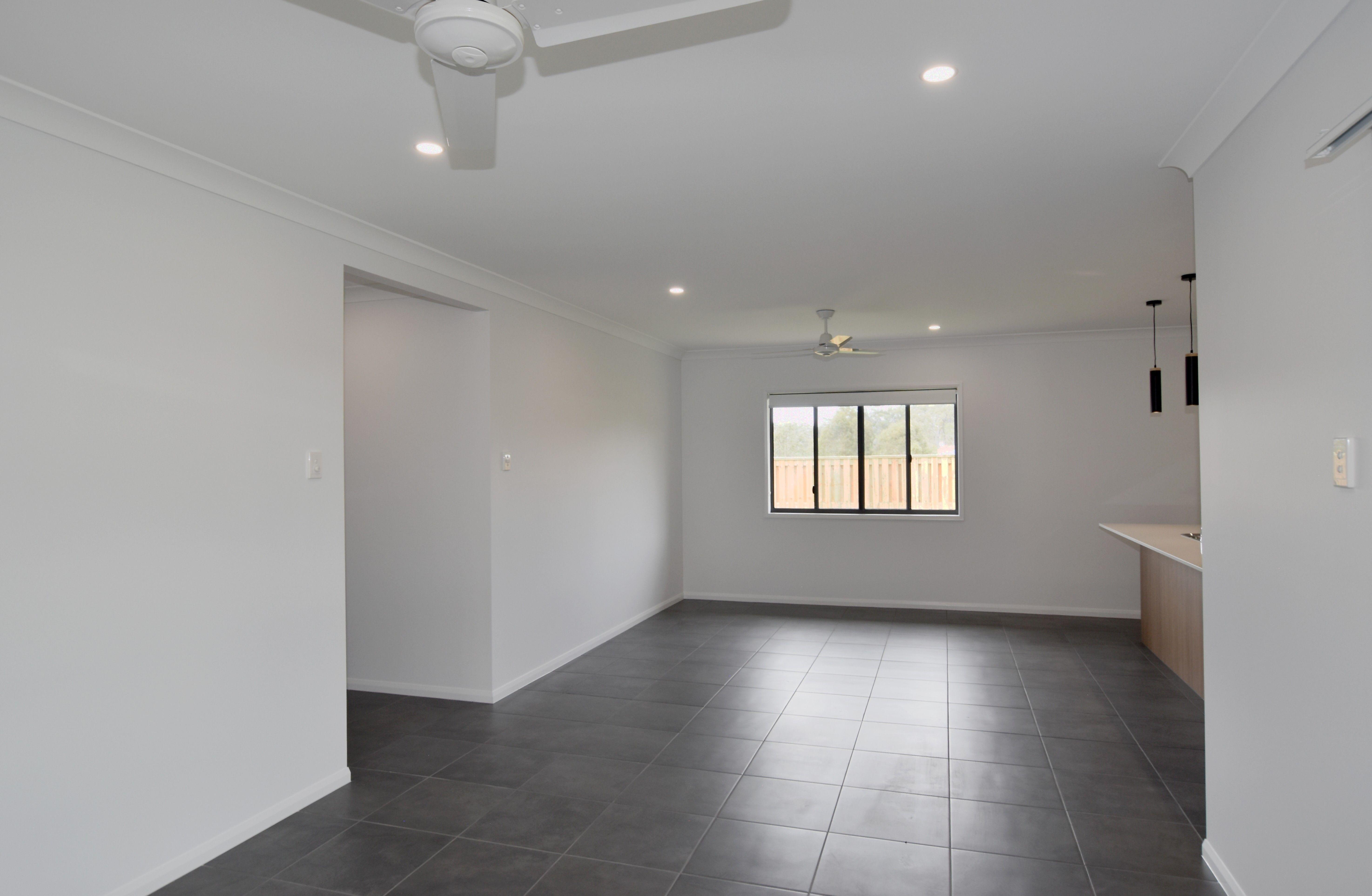 MODERN FOUR BEDROOM HOME IN THE HEART OF RIVERSTONE RISE