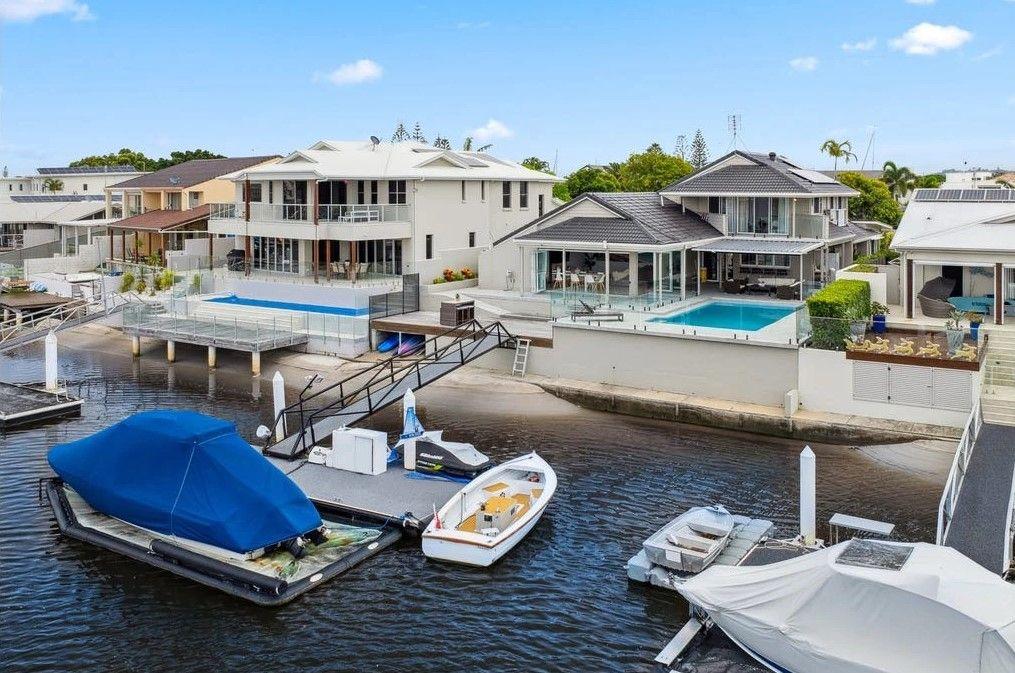 Prop-GPT: House: QLD Minyama, QLD 4575 Exceptional Waterfront Residence in Prime Minyama location
