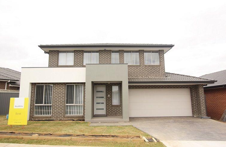 Prop-GPT: House: NSW Oran Park, NSW 2570 Everything you need- the perfect family home!