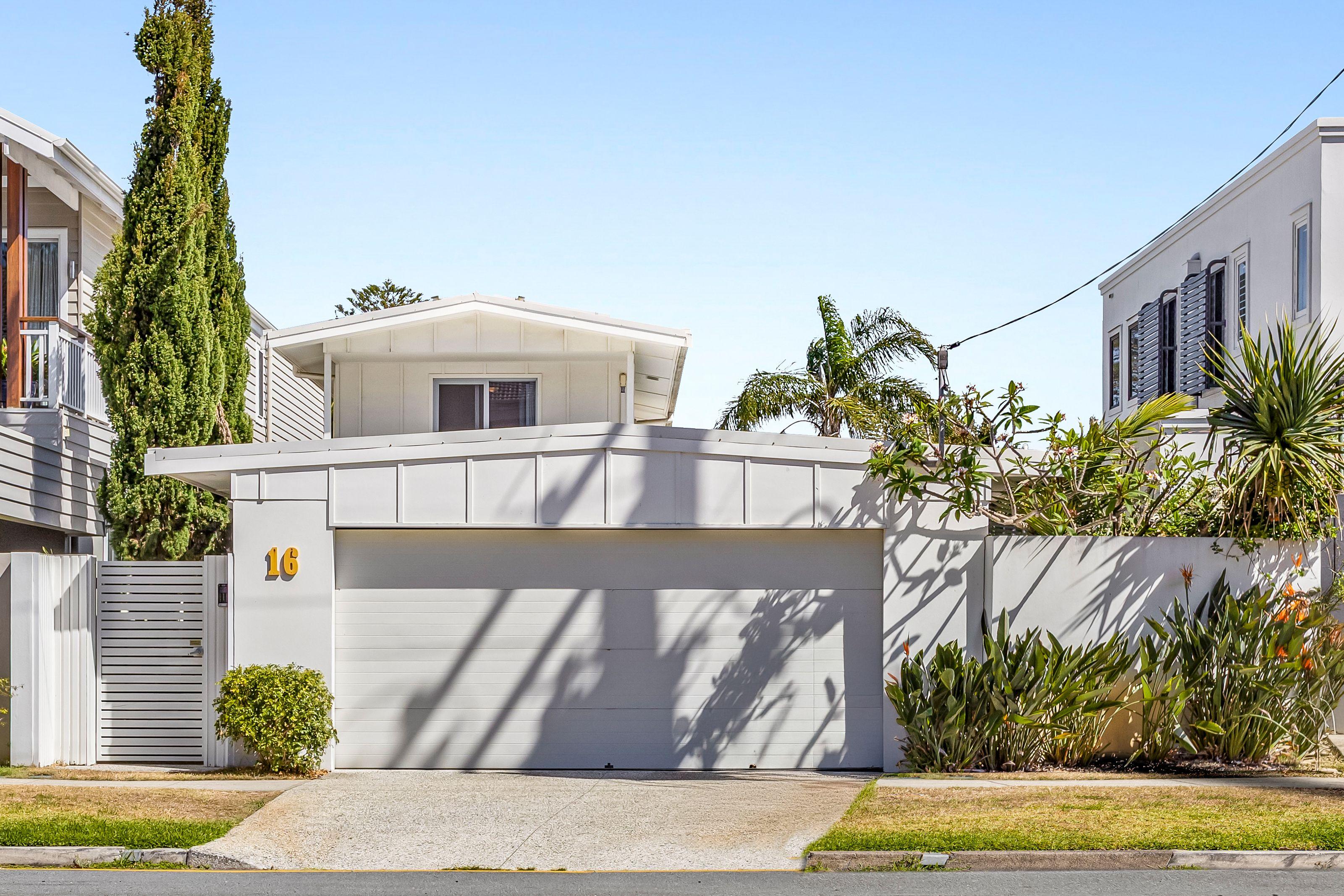 Prop-GPT: House: QLD Miami, QLD 4220 Where Innovation Meets Indulgence - Coastal Perfection in Miami