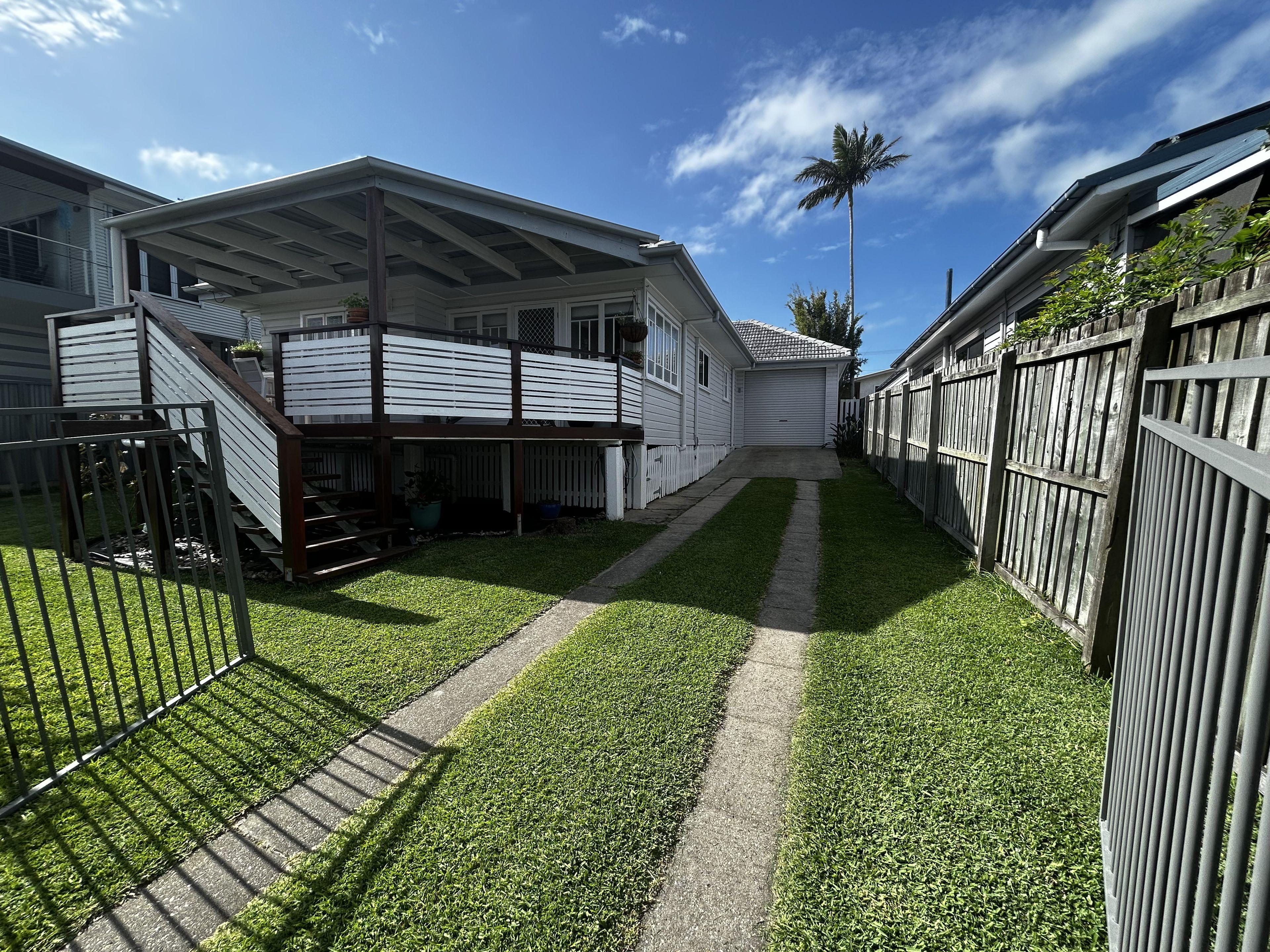 Prop-GPT: House: QLD Margate, QLD 4019 Coastal Charm Meets Modern Comfort