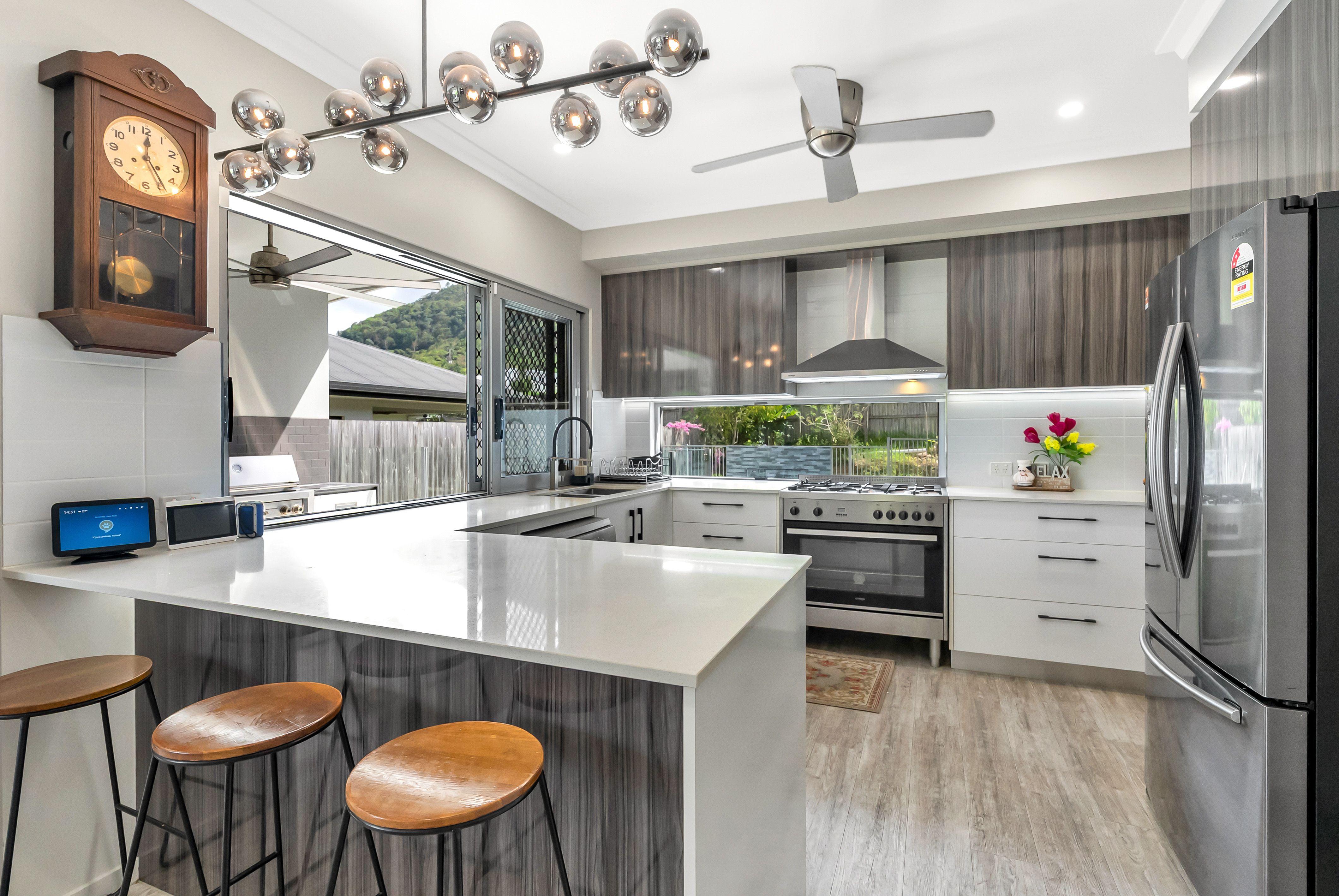 Prop-GPT: House: QLD Kanimbla, QLD 4870 Executive Family Home - Fully Furnished