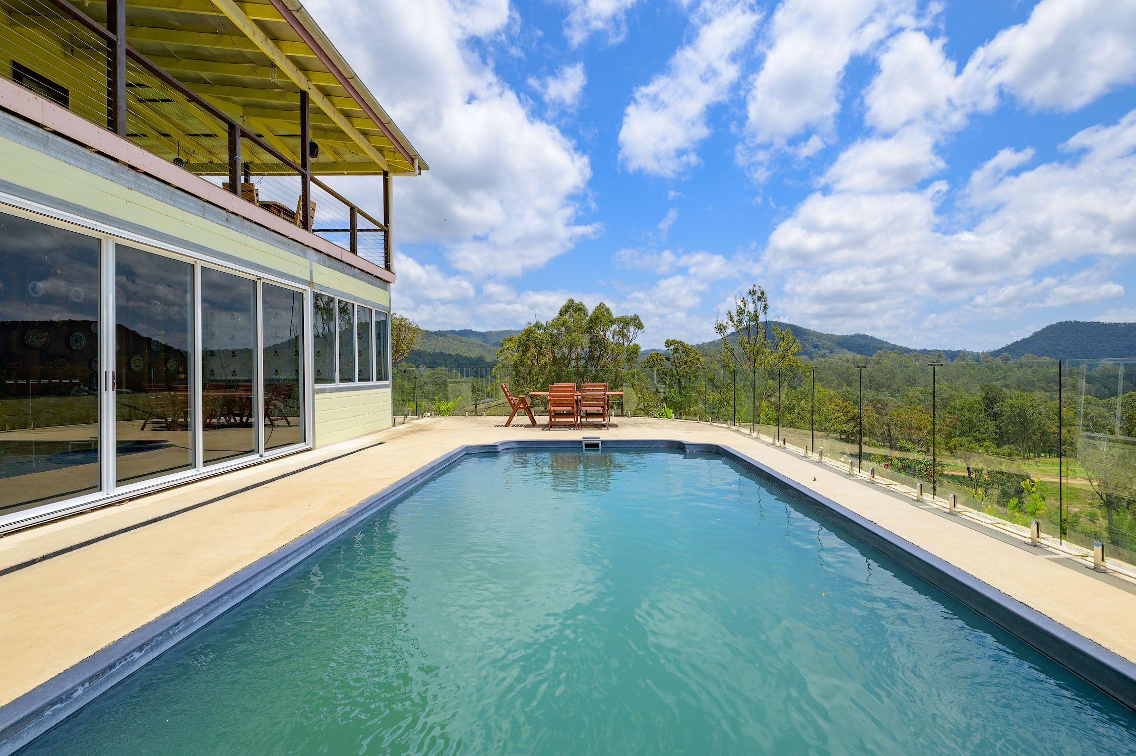 Amamoor Creek Acreage Oasis: Breathtaking Views & Self-Sufficient Living