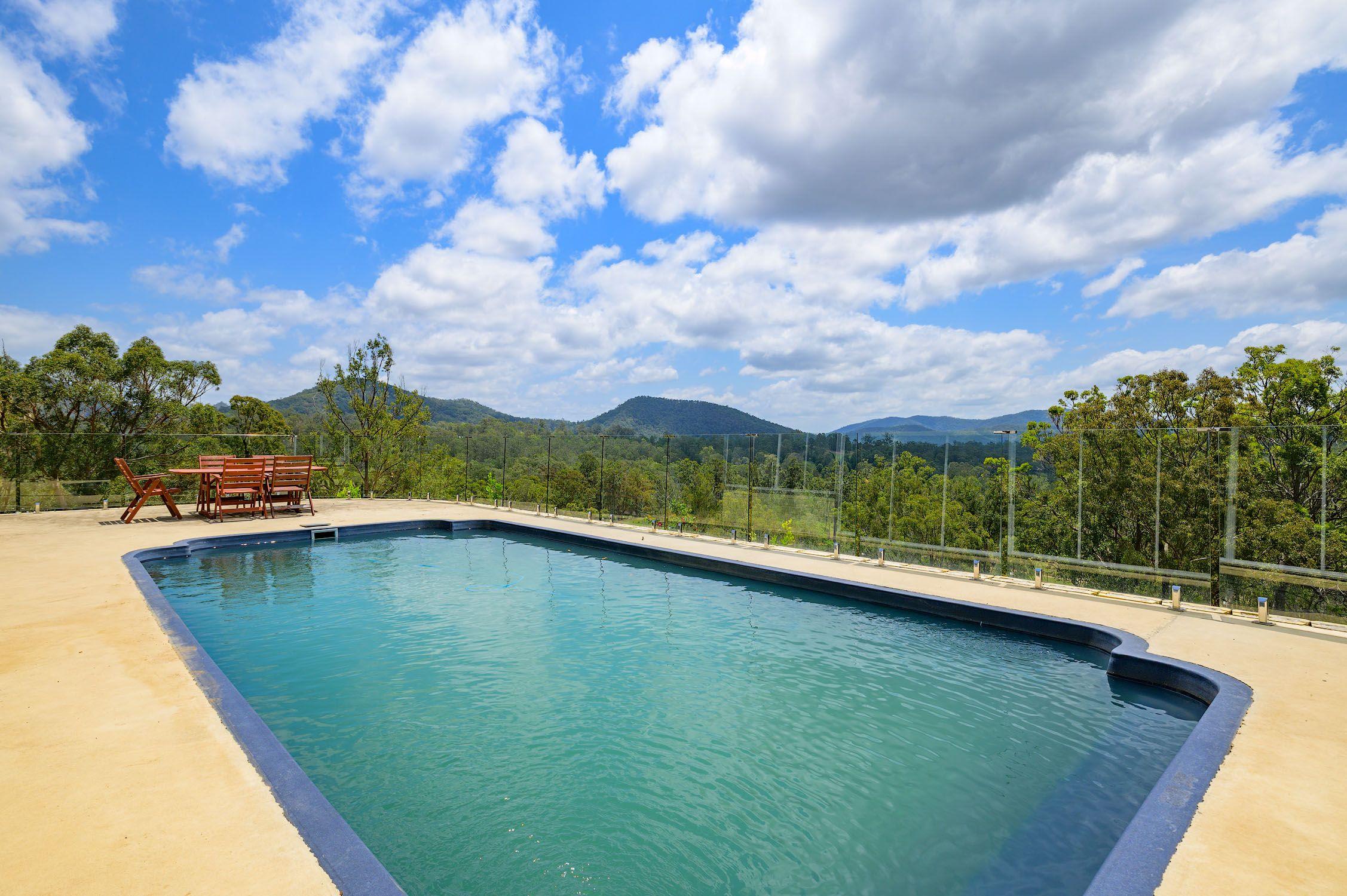 Amamoor Creek Acreage Oasis: Breathtaking Views & Self-Sufficient Living