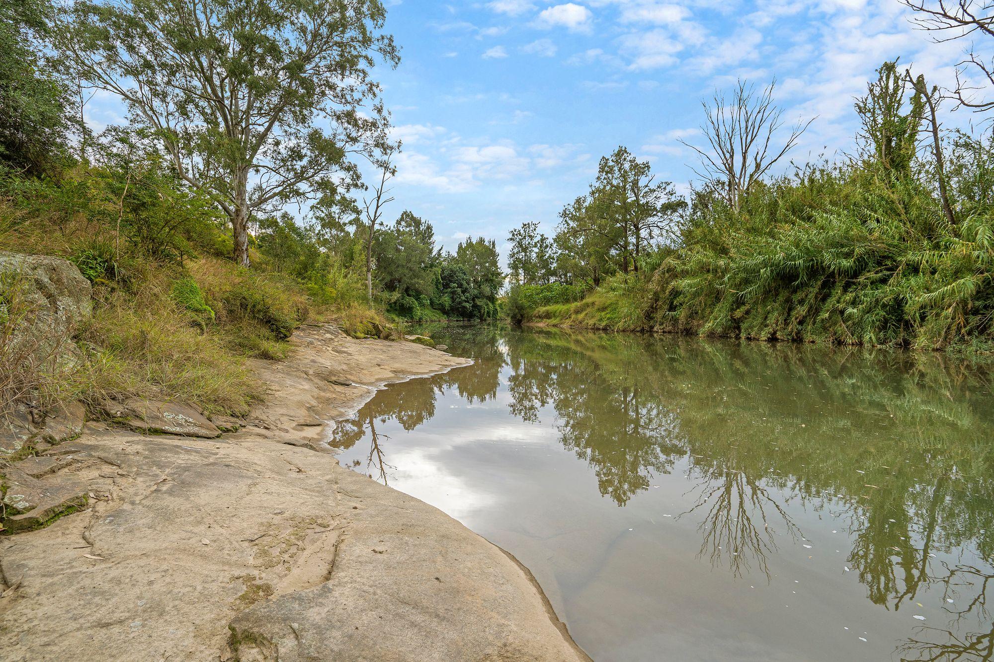 A Rare Riverfront Paradise Awaits - Welcome to Millpond Estate!