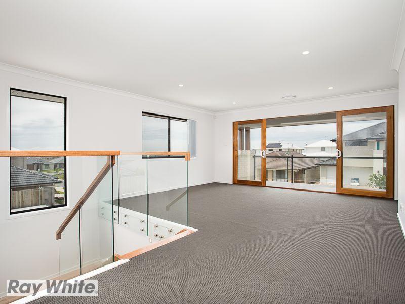 Boasting 4 Living Zones, Sought After Location, Amazing Entertaining & Much More...