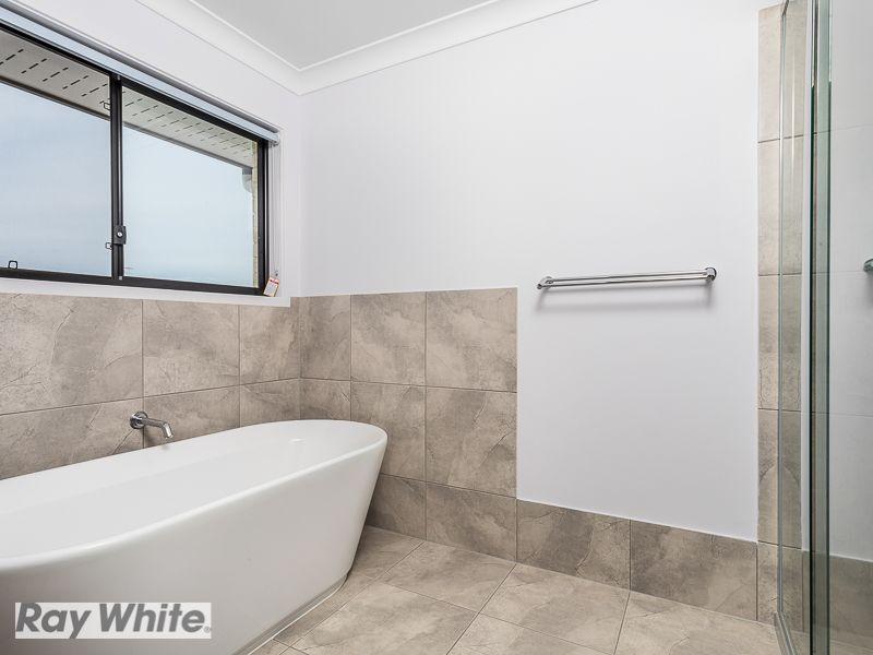 Boasting 4 Living Zones, Sought After Location, Amazing Entertaining & Much More...