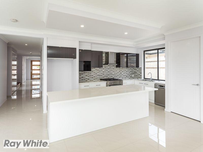 Boasting 4 Living Zones, Sought After Location, Amazing Entertaining & Much More...