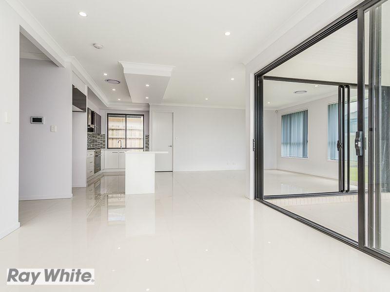 Boasting 4 Living Zones, Sought After Location, Amazing Entertaining & Much More...