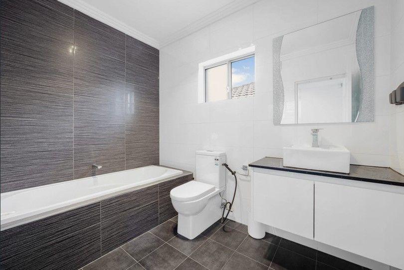 Stylishly finished duplex in Central Location !!!