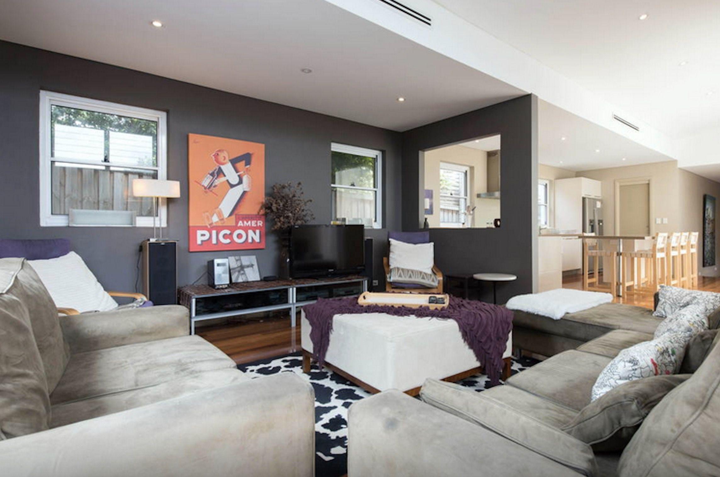 DECEPTIVELY LARGE, GORGEOUS DESIGNER HOME ON QUIET RESIDENTIAL STREET, WITH HARBOUR VIEWS!