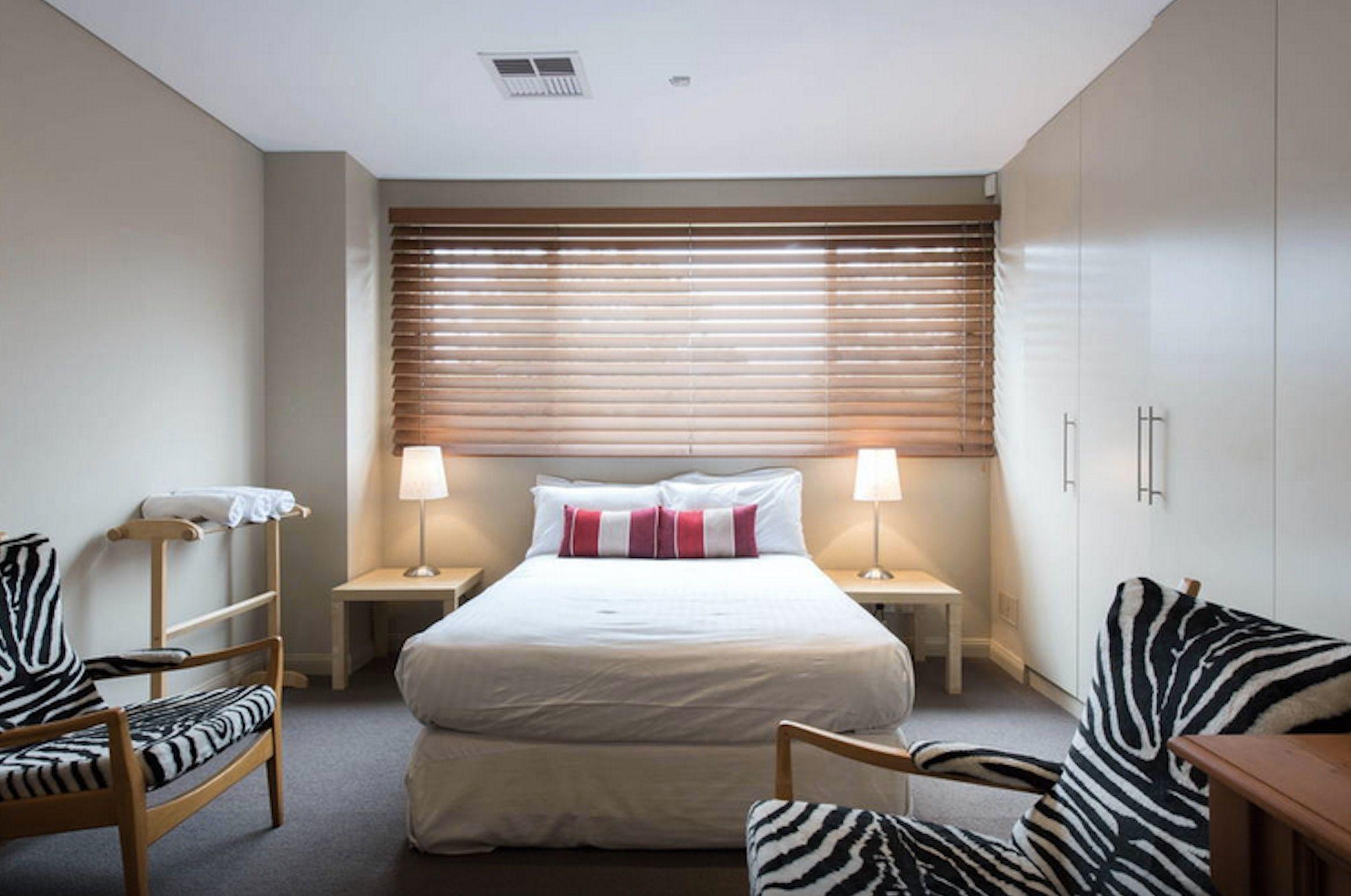 DECEPTIVELY LARGE, GORGEOUS DESIGNER HOME ON QUIET RESIDENTIAL STREET, WITH HARBOUR VIEWS!