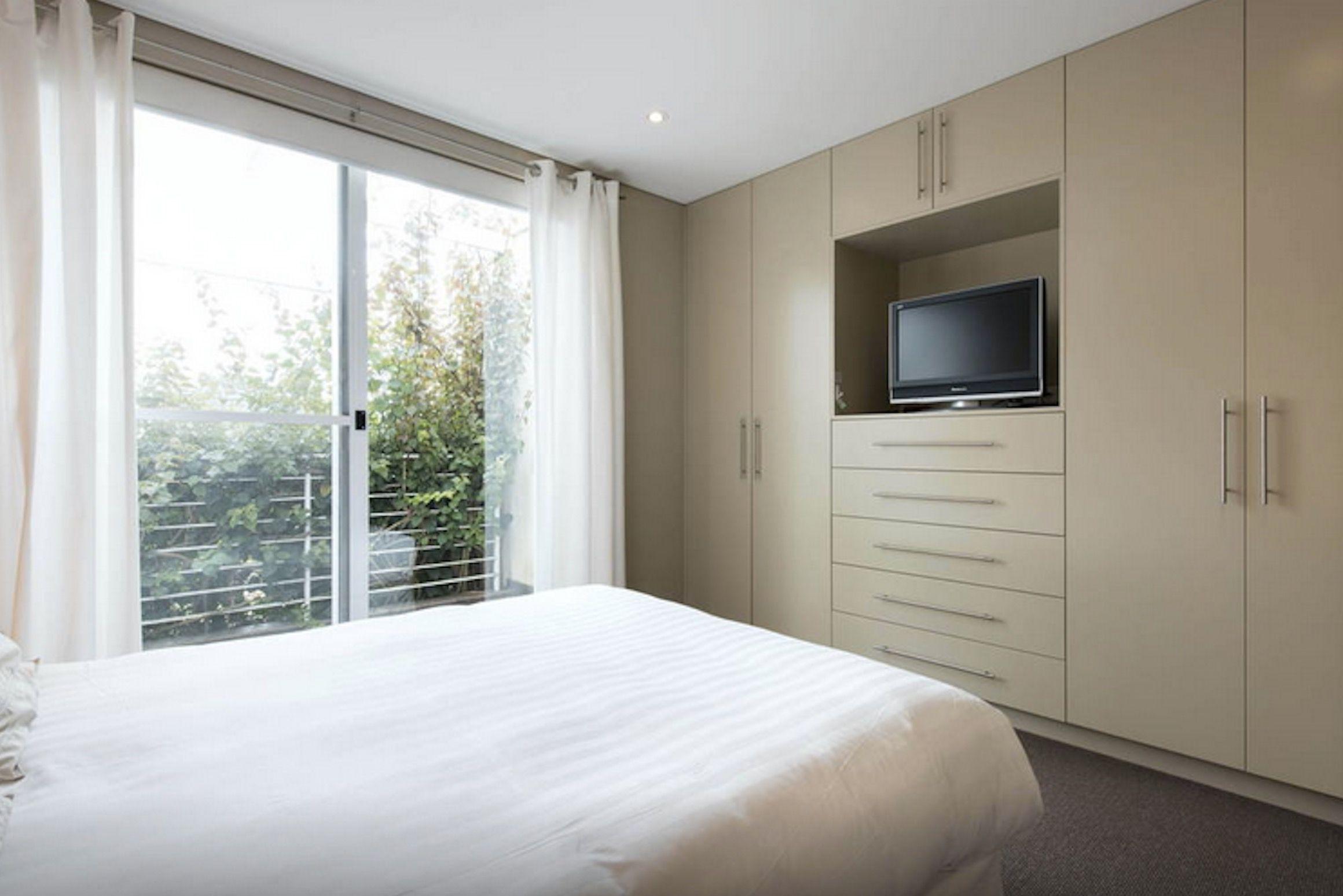 DECEPTIVELY LARGE, GORGEOUS DESIGNER HOME ON QUIET RESIDENTIAL STREET, WITH HARBOUR VIEWS!