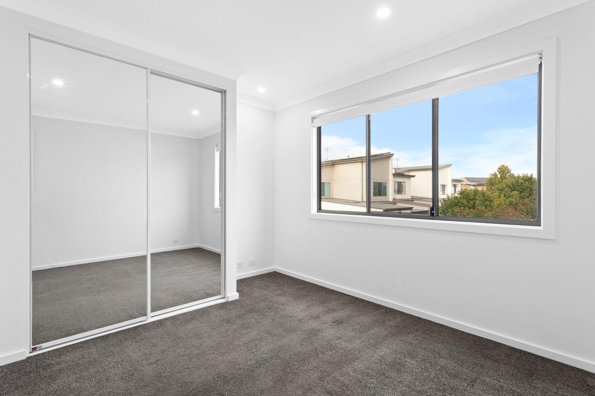 PREMIUM NORTH FACING TWO BEDROOM HOME Within 5 minutes walk to Schofields Train Station!