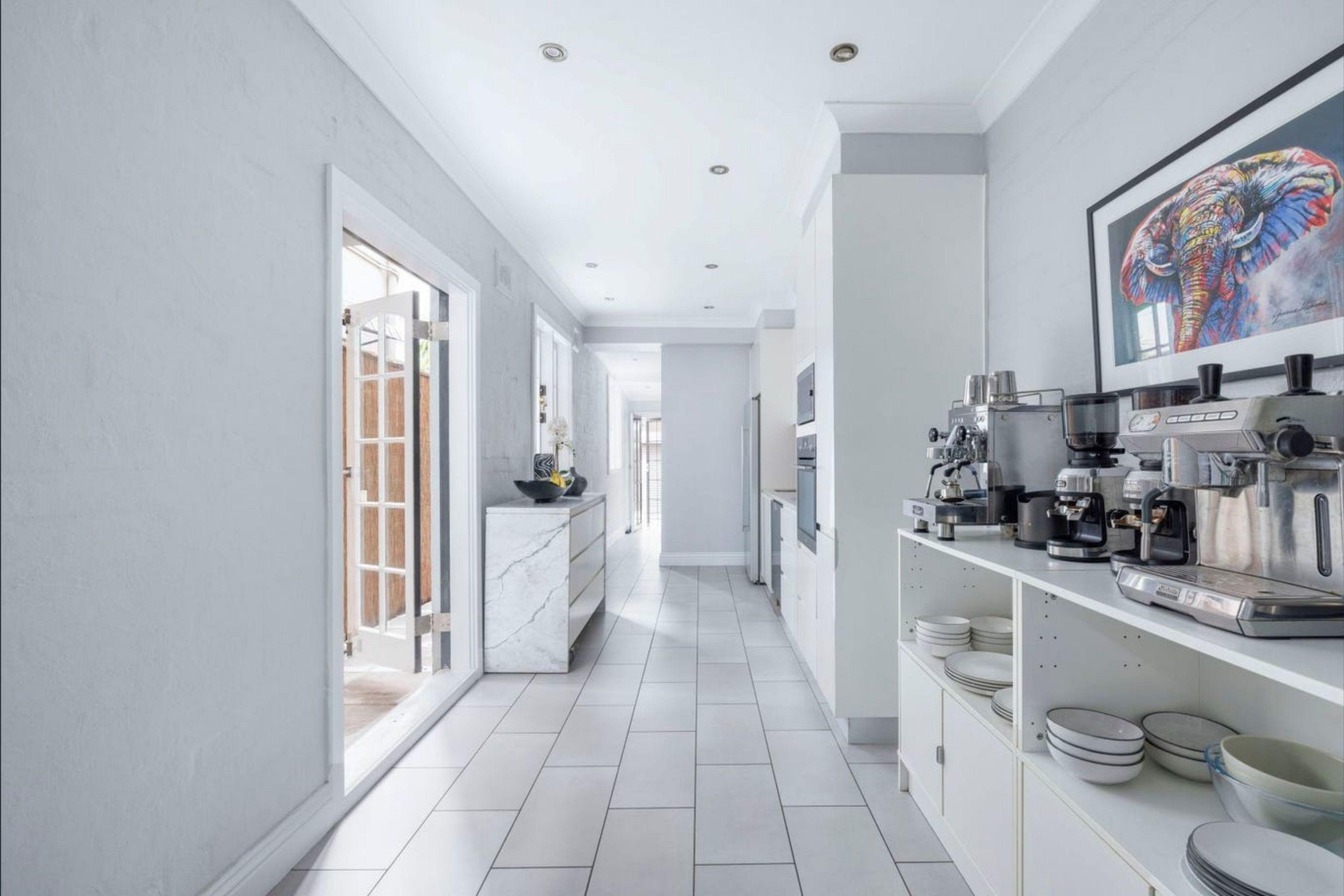 Elegant 4-Bedroom Terrace with Dual Parking in the Heart of Surry Hills