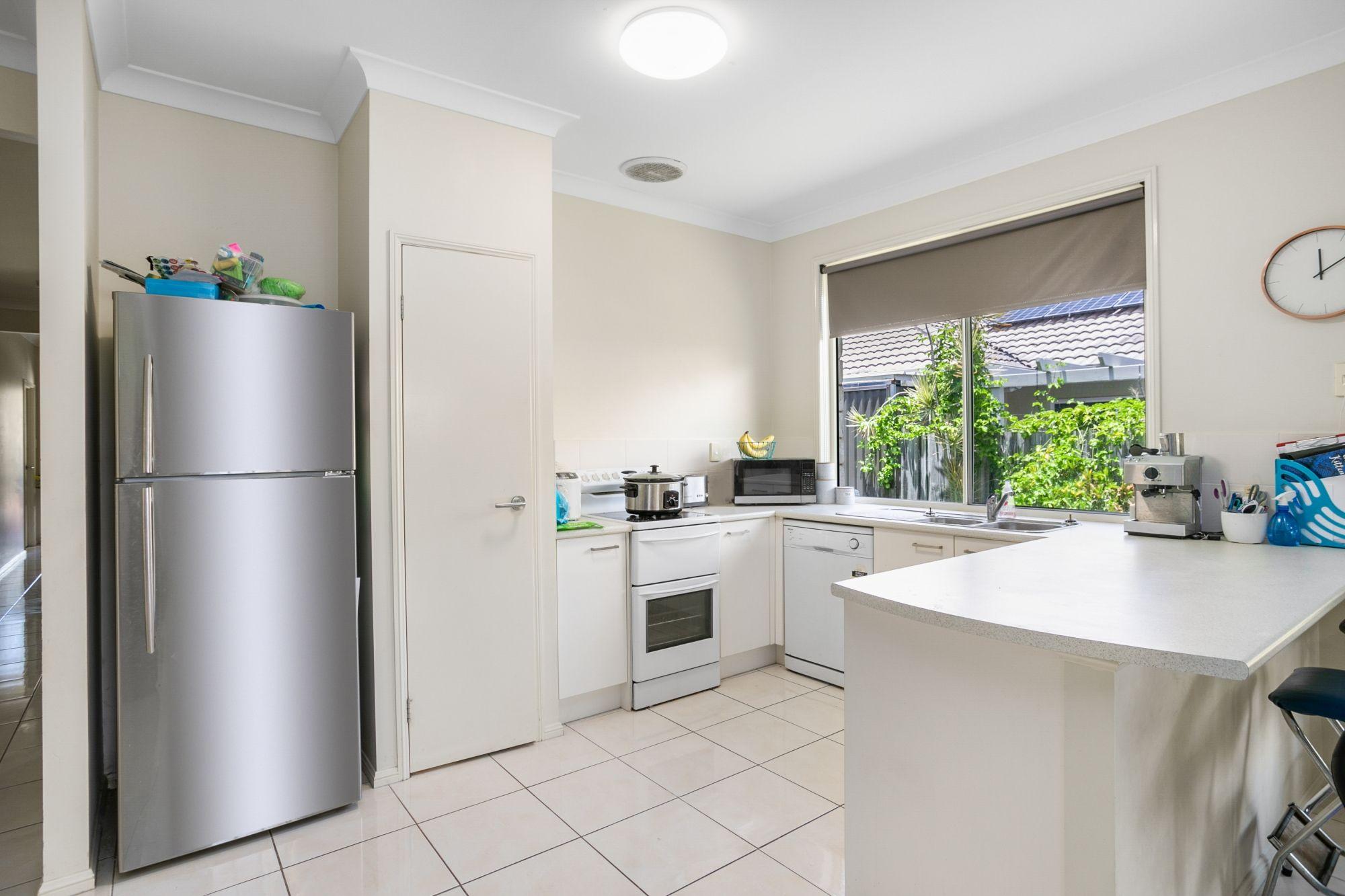 FOUR BEDROOM HOME ON A QUIET STREET AND OVERLOOKING A PARKLAND!