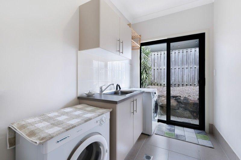 Elevated Living: Spacious, Sunlit Sanctuary in Pacific Pines