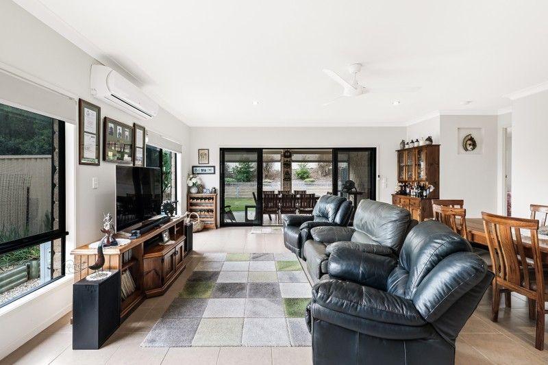 Elevated Living: Spacious, Sunlit Sanctuary in Pacific Pines