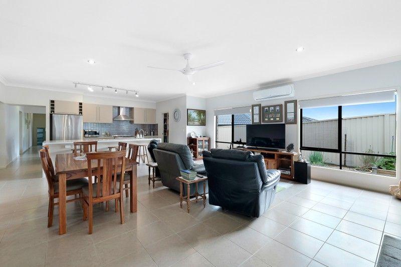 Elevated Living: Spacious, Sunlit Sanctuary in Pacific Pines