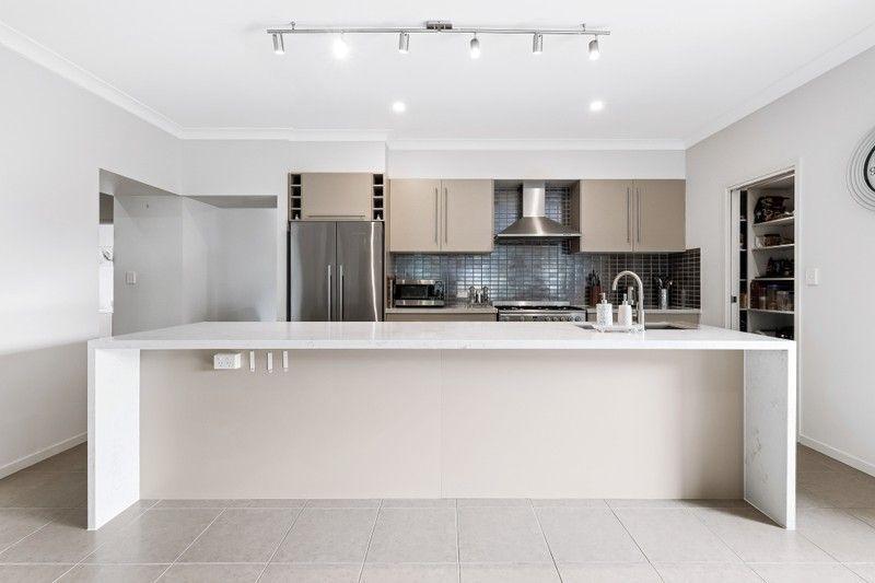 Elevated Living: Spacious, Sunlit Sanctuary in Pacific Pines