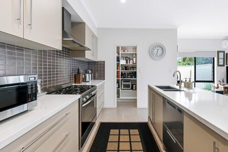 Elevated Living: Spacious, Sunlit Sanctuary in Pacific Pines