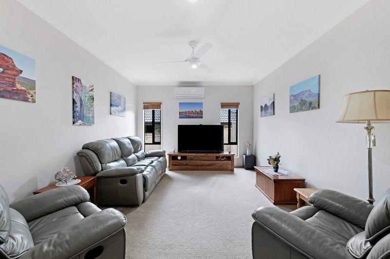 Elevated Living: Spacious, Sunlit Sanctuary in Pacific Pines