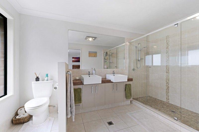 Elevated Living: Spacious, Sunlit Sanctuary in Pacific Pines