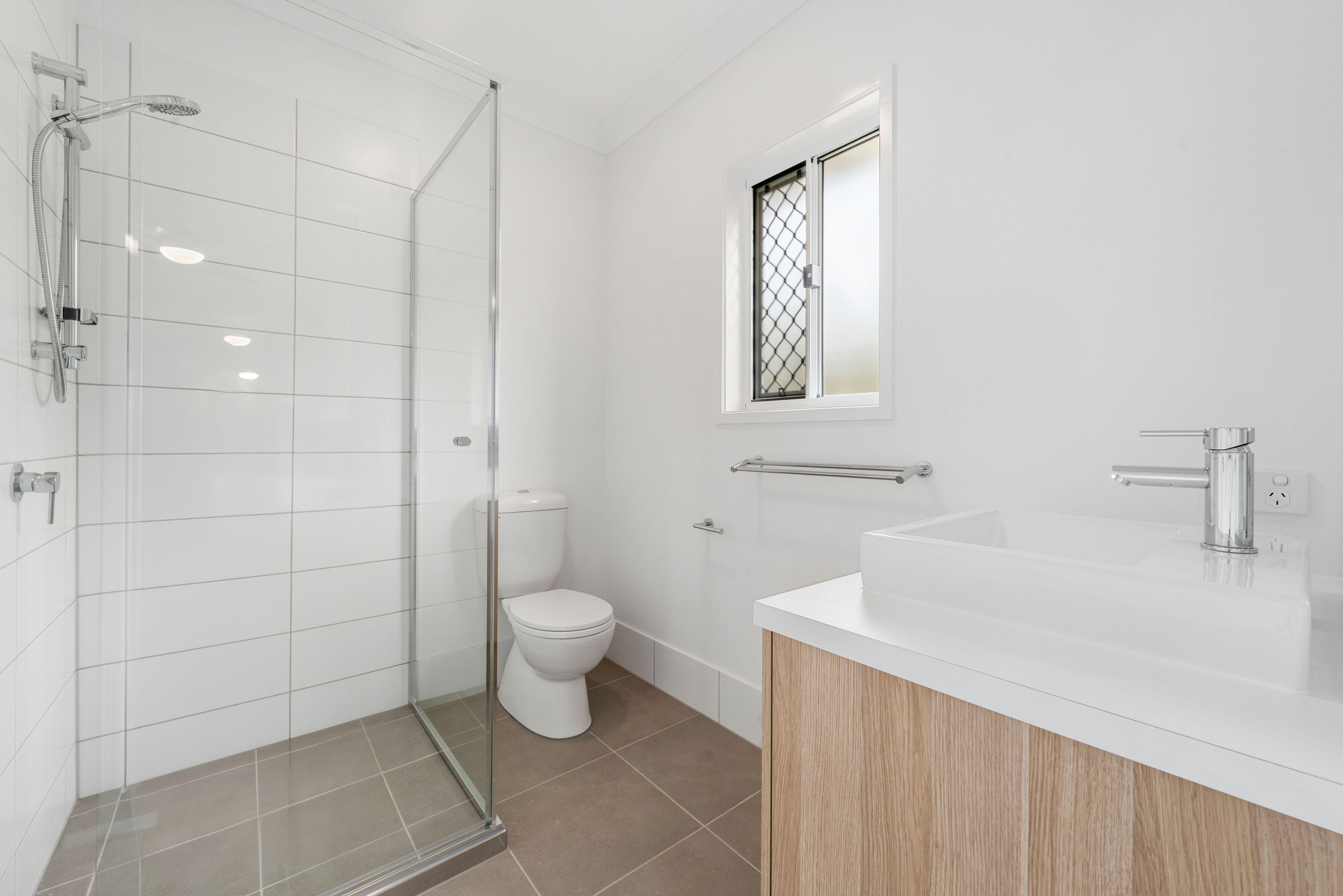 NEAR NEW FOUR BEDROOM HOME WITH TWO LIVING AREAS