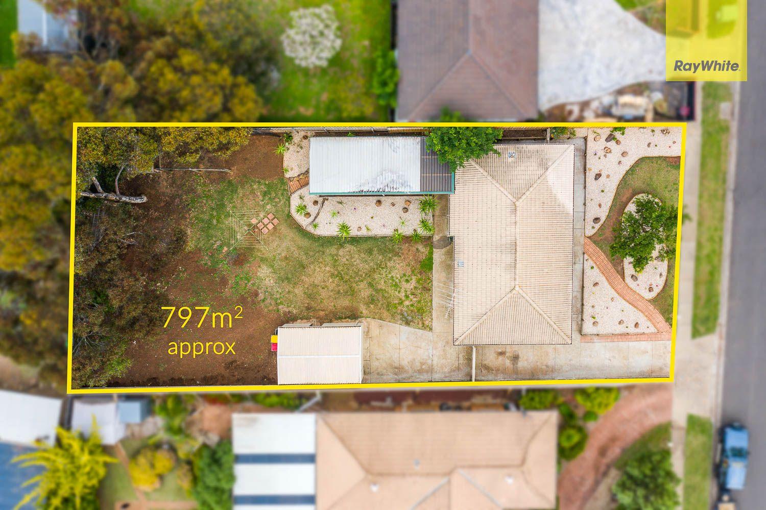 NEAT WITH A LARGE WELL ESTABLISHED YARD