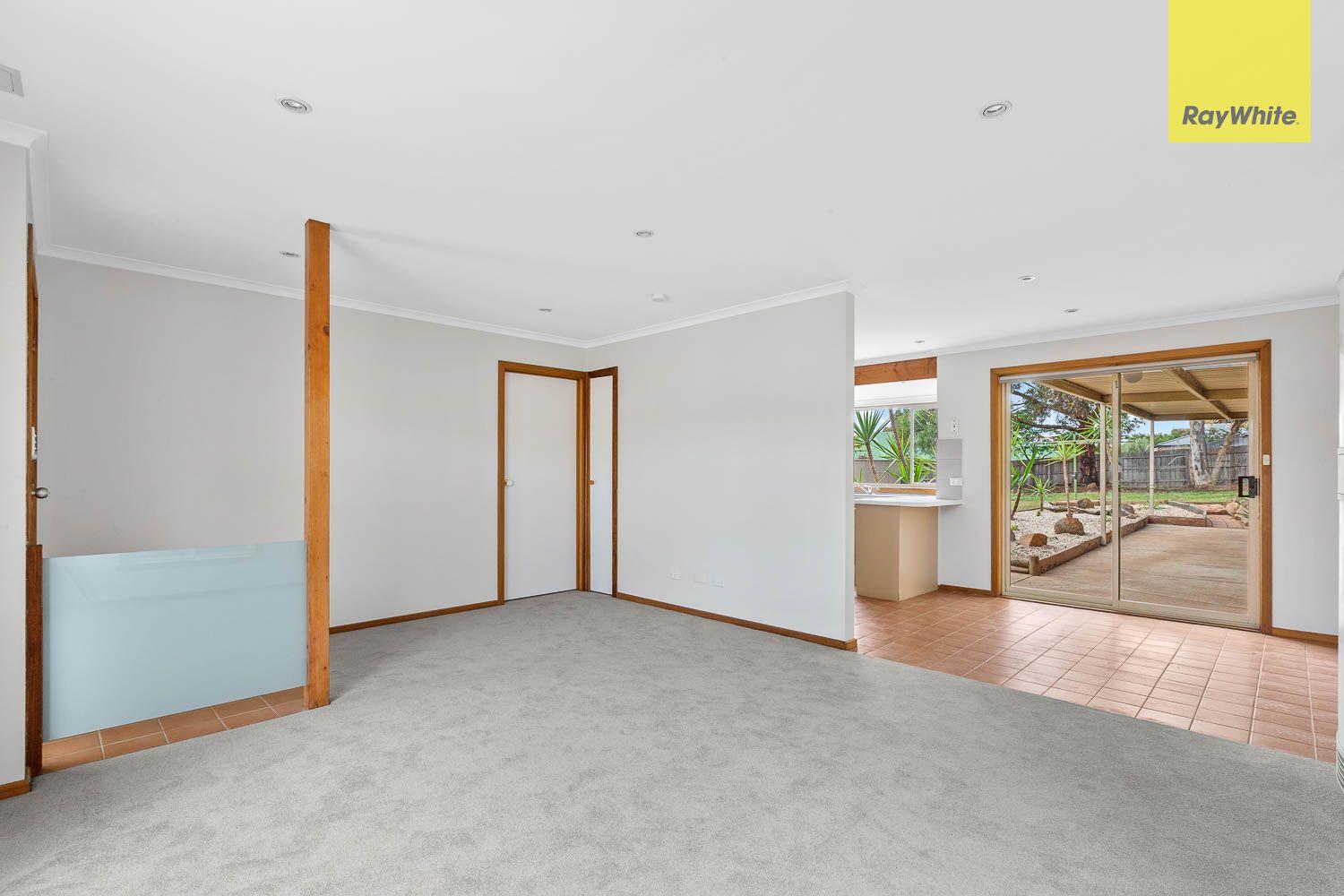 NEAT WITH A LARGE WELL ESTABLISHED YARD