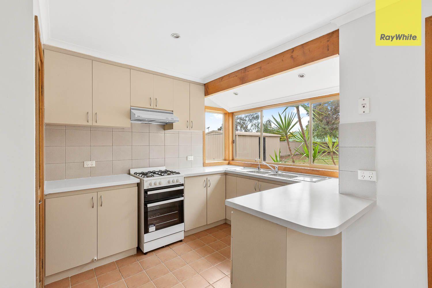 NEAT WITH A LARGE WELL ESTABLISHED YARD