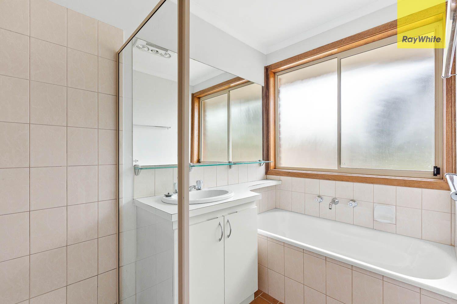 NEAT WITH A LARGE WELL ESTABLISHED YARD