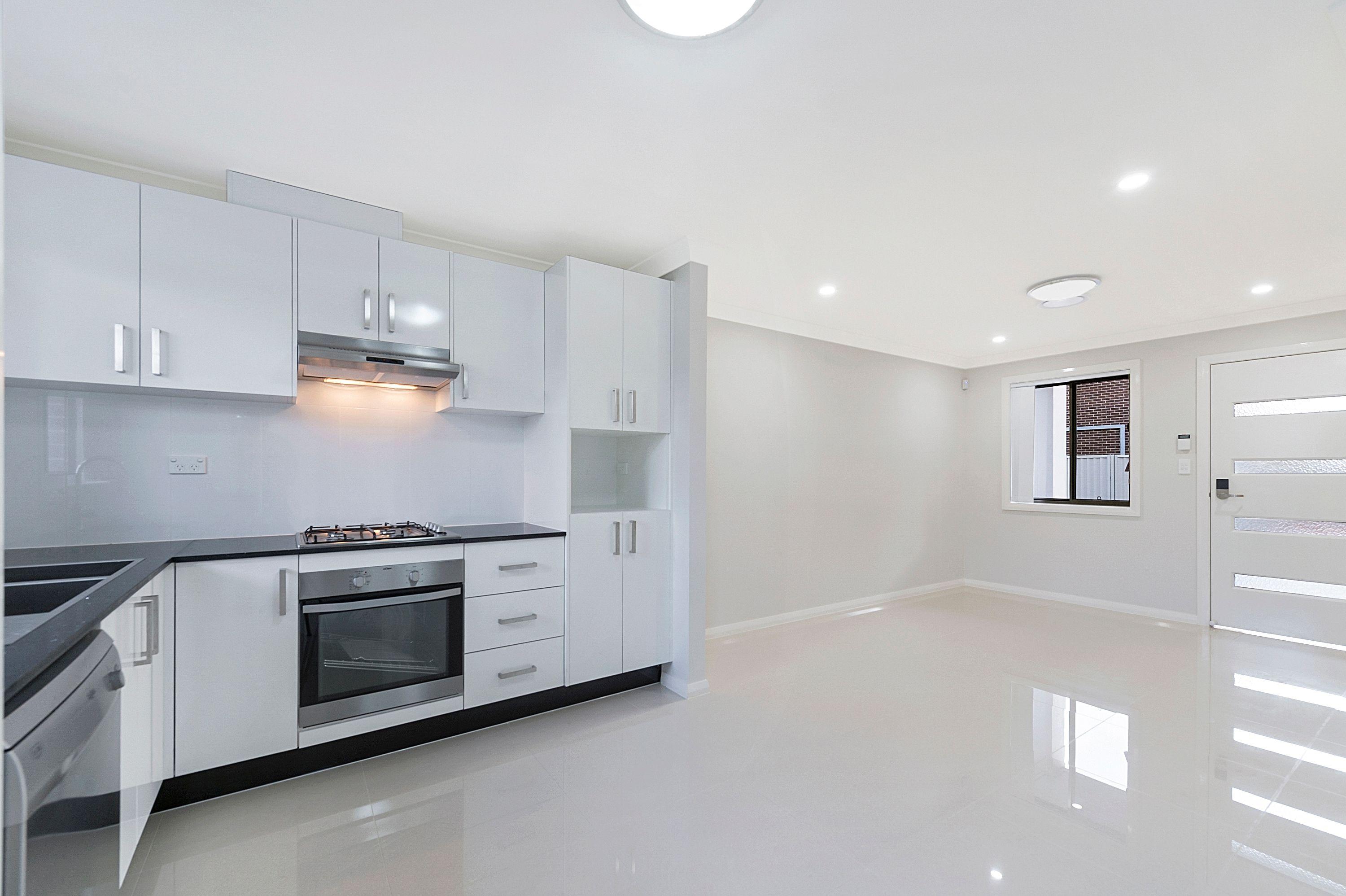Modern Town House With 2 Garages - Walk To Train Station House | NSW Quakers Hill, NSW 2763 | Prop-GPT the AI-Powered Property Portal