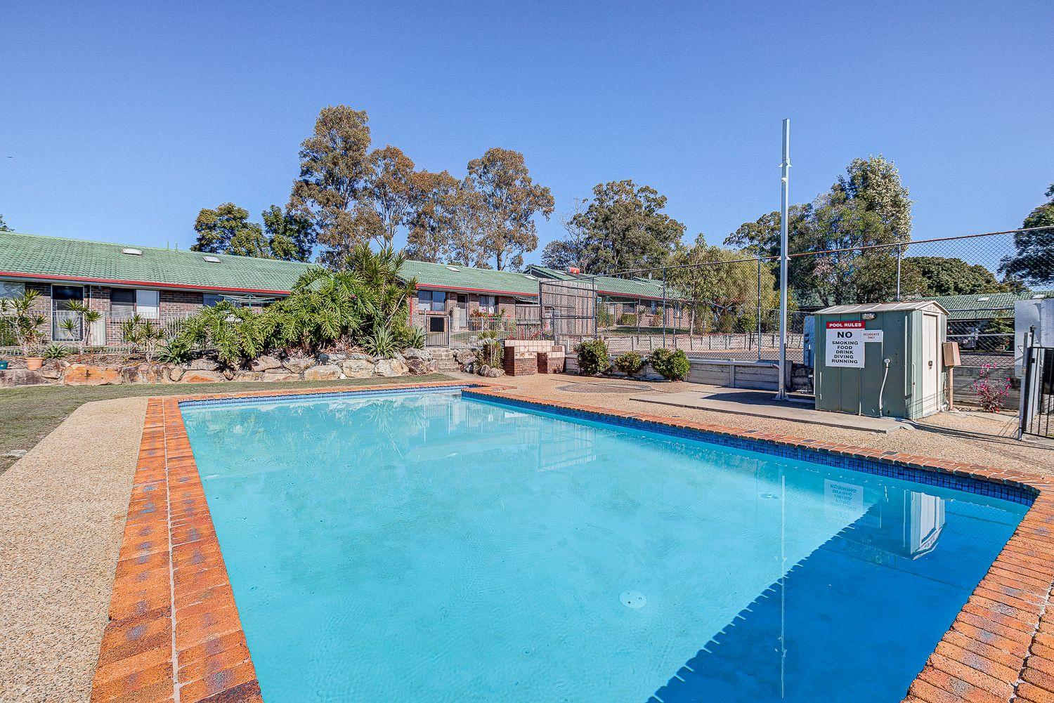 LOW MAINTENANCE & CONVENIENT LIVING IN A GATED COMPLEX!