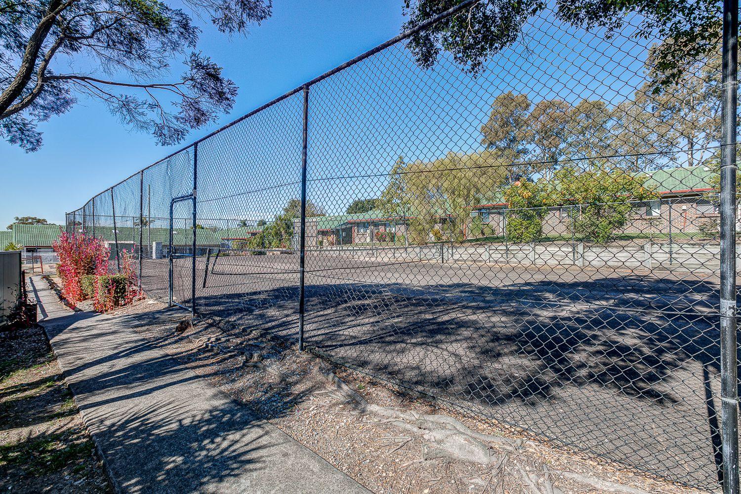 LOW MAINTENANCE & CONVENIENT LIVING IN A GATED COMPLEX!