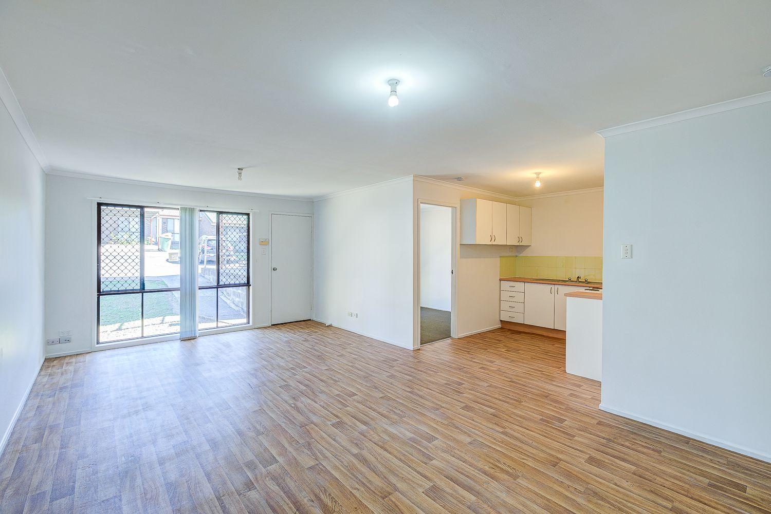 LOW MAINTENANCE & CONVENIENT LIVING IN A GATED COMPLEX!