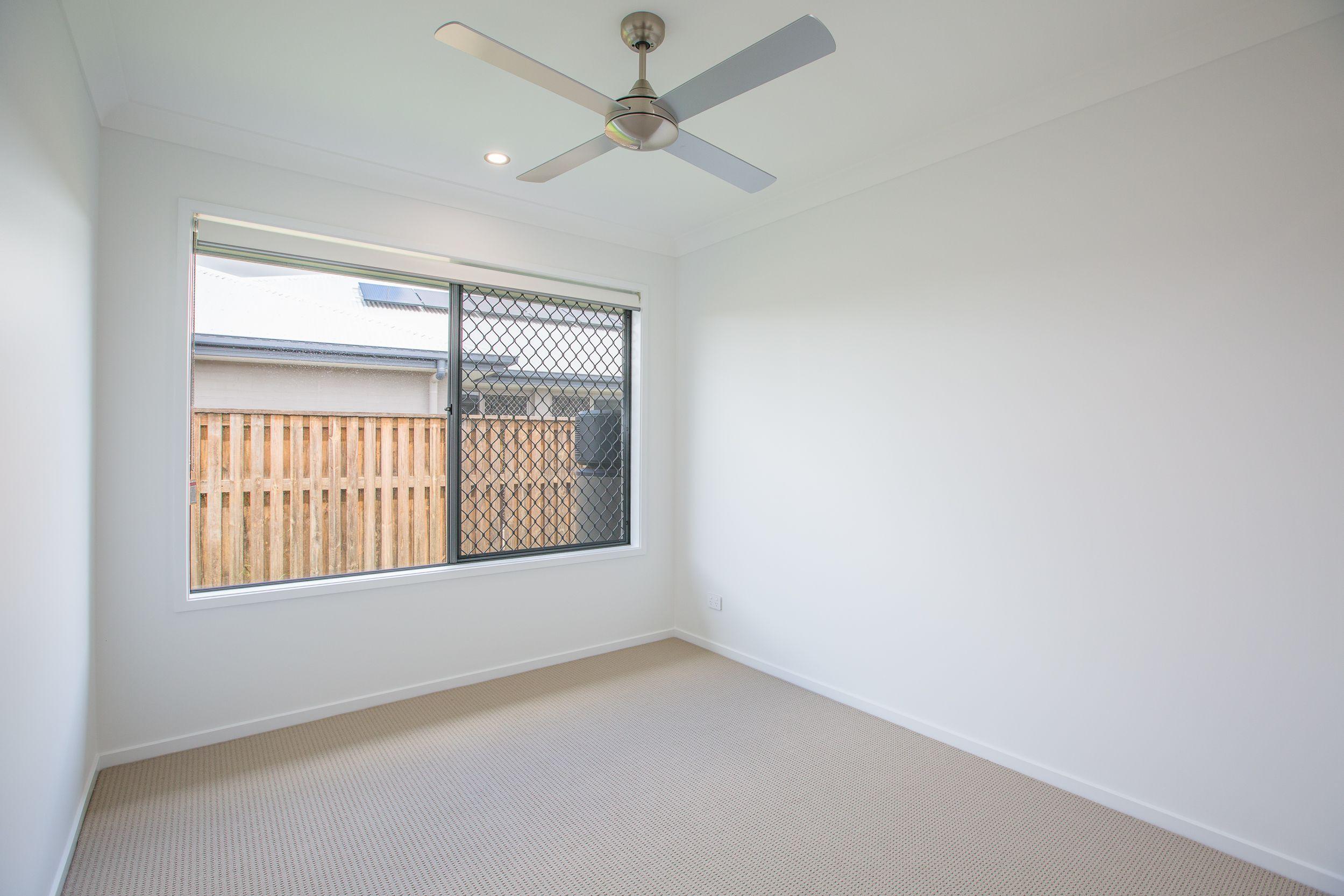 SECURITY SCREENS, AIR CON, SPACIOUS LIVING AND YARD!