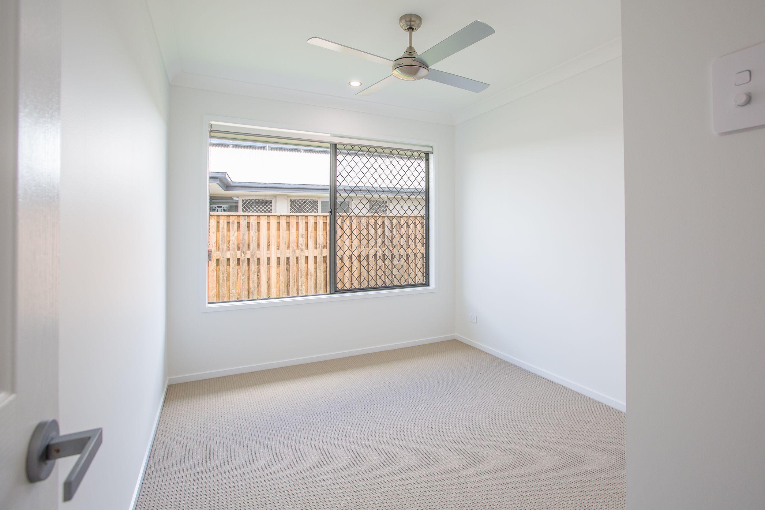 SECURITY SCREENS, AIR CON, SPACIOUS LIVING AND YARD!