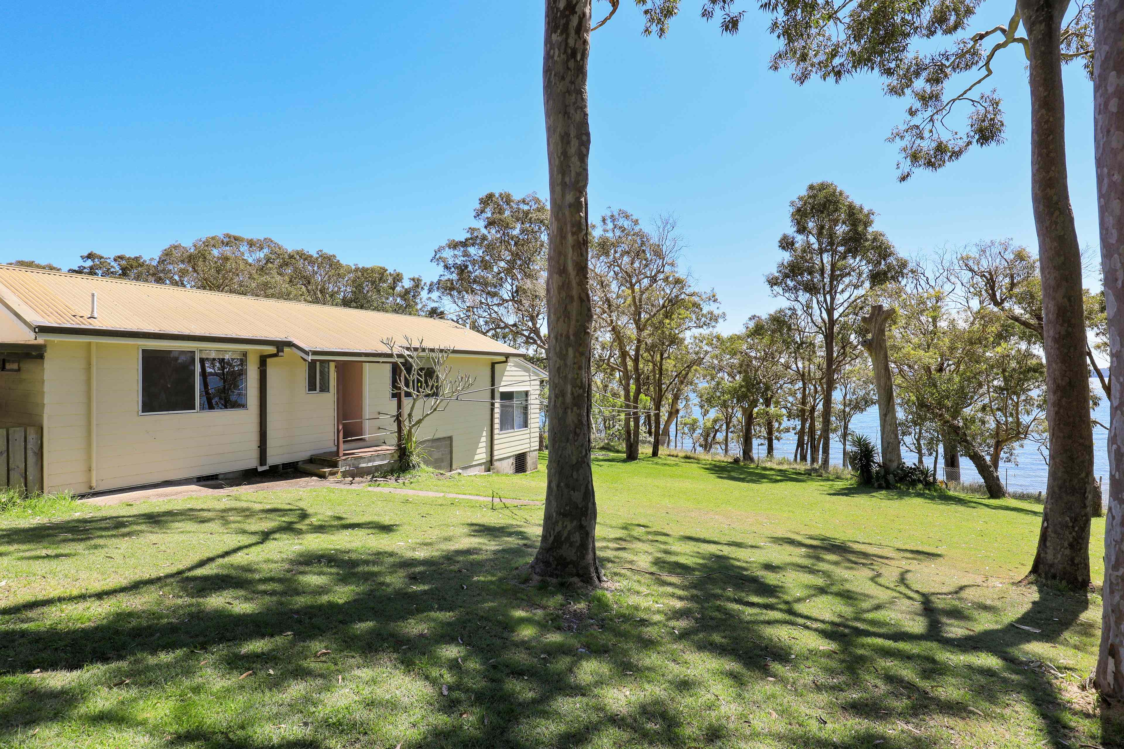 3-Bedroom Waterfront Bushland Retreat- Water included!: NSW Lemon Tree Passage, NSW 2319 House | Prop-GPT the AI-Powered Property Portal