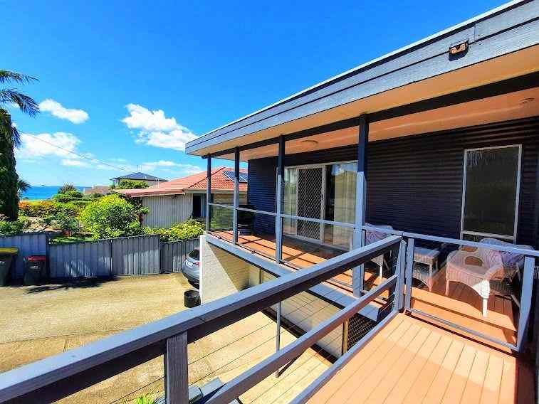 The Essence of Coastal Family Living: NSW Batehaven, NSW 2536 House | Prop-GPT the AI-Powered Property Portal