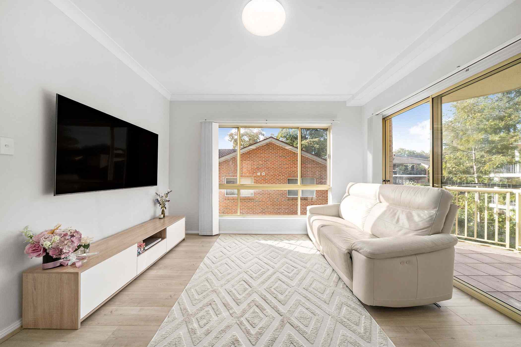 Prop-GPT: Apartment: NSW Hornsby, NSW 2077 Quiet East Facing 2 Bedroom, 2 Bathroom Apartment