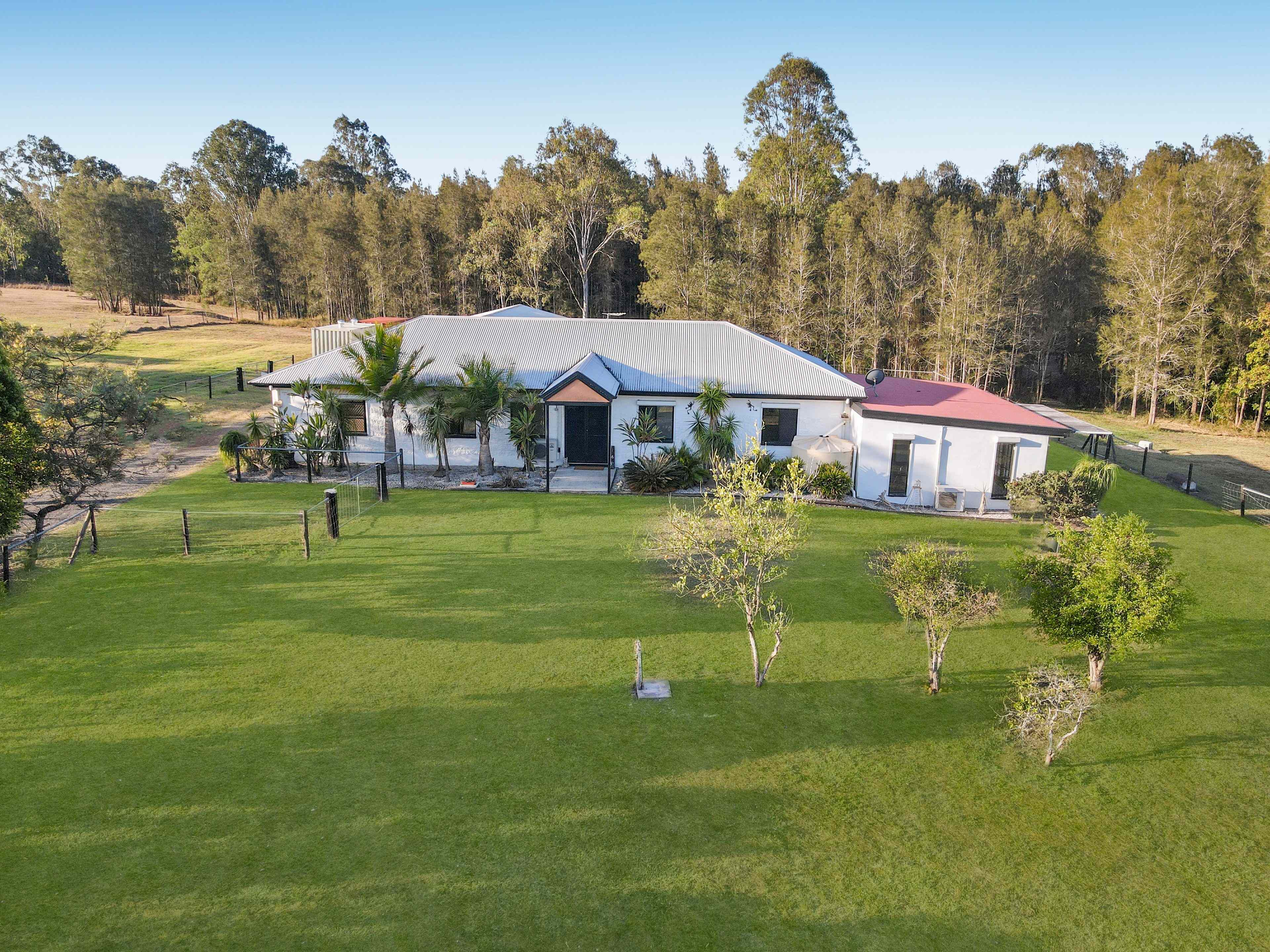 Spacious Family Home on Expansive Block with Dual Living & Bushland Outlook: QLD Walloon, QLD 4306 Lifestyle | Prop-GPT the AI-Powered Property Portal