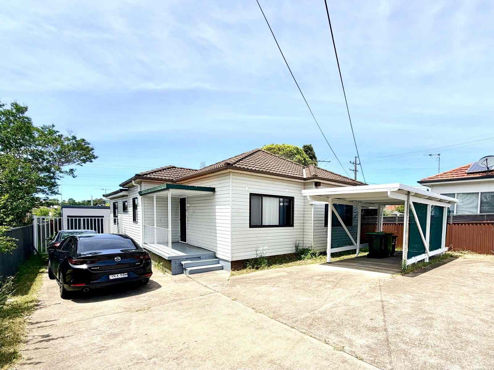 Spacious 3-Bedroom Home with Study/Office and Ample Parking: NSW Greenacre, NSW 2190 House | Prop-GPT the AI-Powered Property Portal