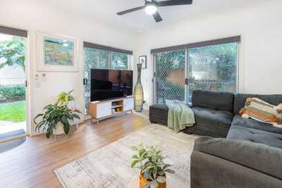 Ground-Floor Apartment with Double Garage & Garden Oasis: QLD Biggera Waters, QLD 4216 House | Prop-GPT the AI-Powered Property Portal